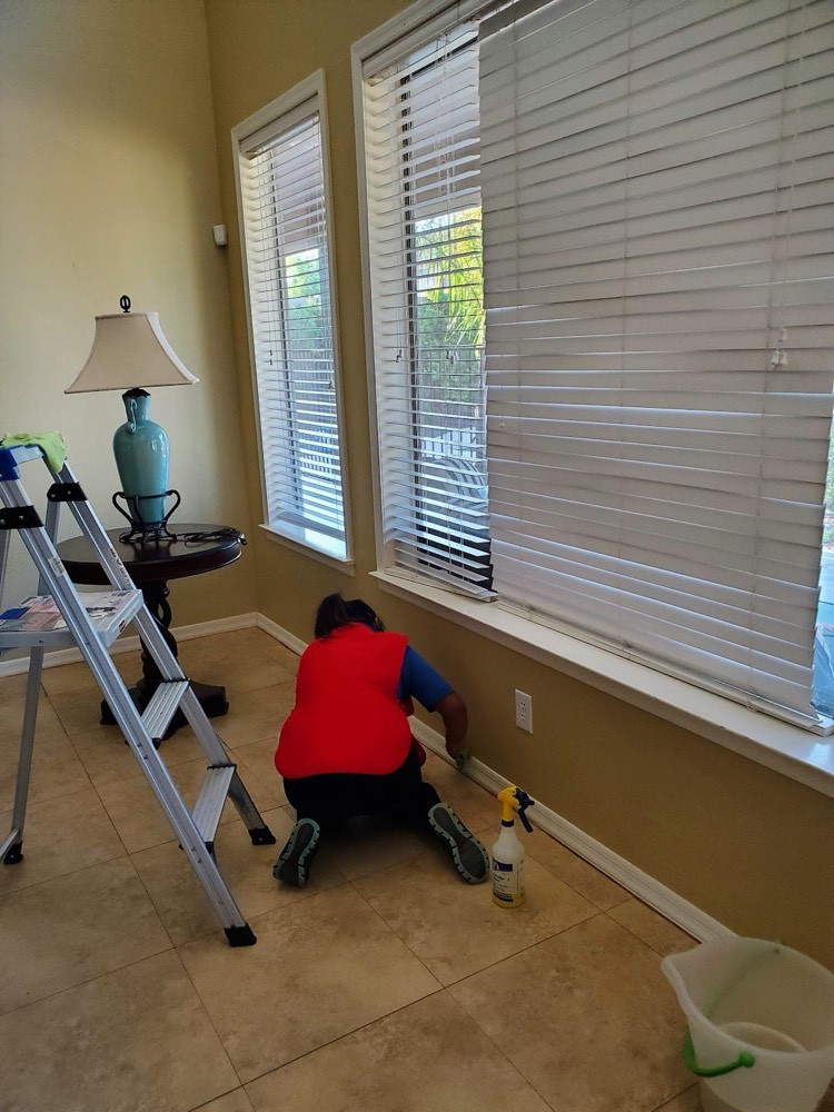 House cleaner from Spotless House Cleaning Sugar Land cleaning a home in First Colony